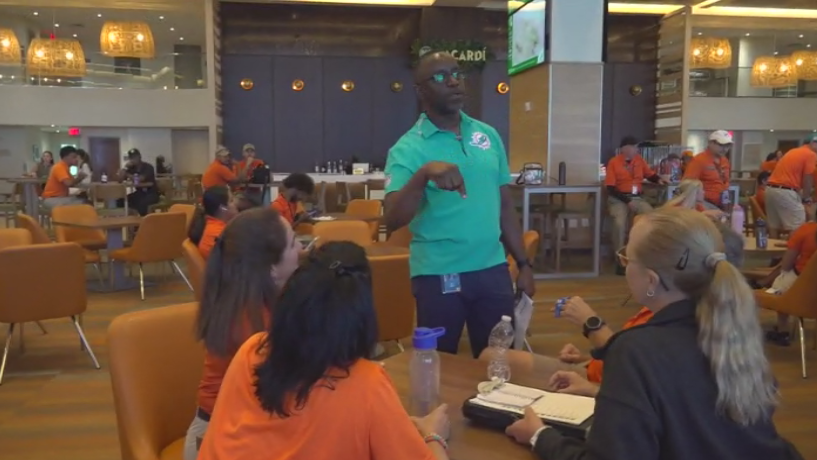 Miami Dade College professor finds his passion with side job at Hard Rock Stadium — CBS Miami, Nocatee Arts news